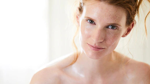 Model with dewy skin after Tri-Balm facial